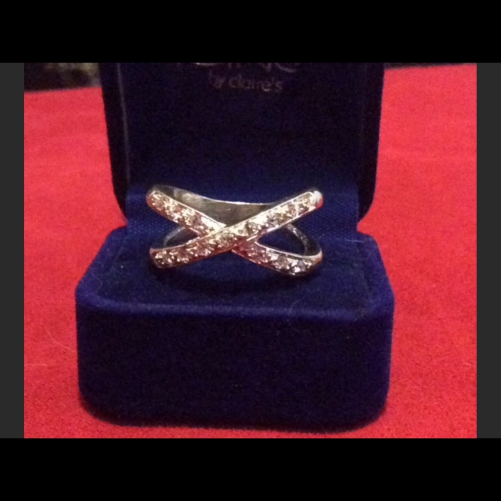 Ring of genuine crystals set in simulated silver.